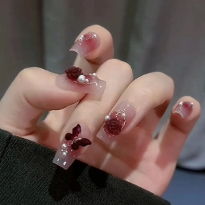 Luxury 3D butterfly and rose press-on nails with red gradient and pearl details