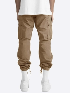 Rear view of khaki cargo pants showing large back pockets and adjustable drawstring cuffs