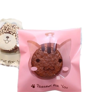 Pink translucent cartoon snack bags featuring cat and bear windows for cookies