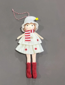 Detail of a handmade plush Christmas doll with red polka dot dress and striped scarf decor