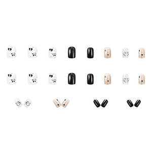 24-piece press-on nails featuring black, cat paw, and glitter star designs for women