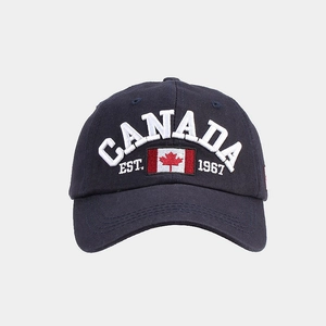Detail of premium navy blue cotton baseball cap with white Canada flag embroidery