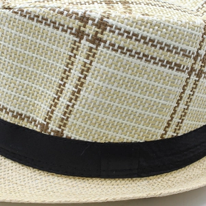 Close-up of beige and brown woven straw fedora with a black silk texture ribbon
