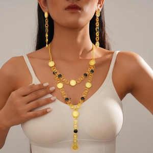 Vintage gold coin pendant necklace and earrings set with black enamel accents for women