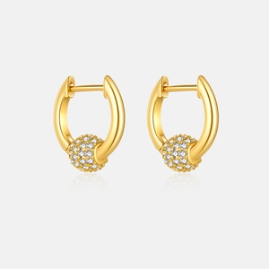 Detail of S925 gold hoop earrings featuring a micro-paved white zircon ball pendant