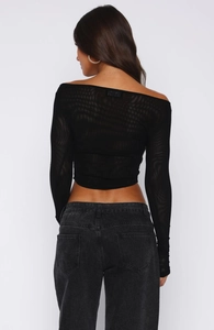 Detail of sheer black off-shoulder mesh top with unique wavy textured fabric for women