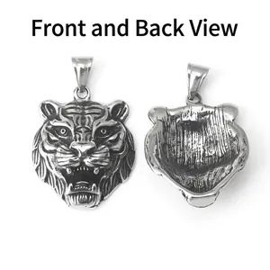 Front and back view of a 3D stainless steel tiger head pendant with detailed engraving