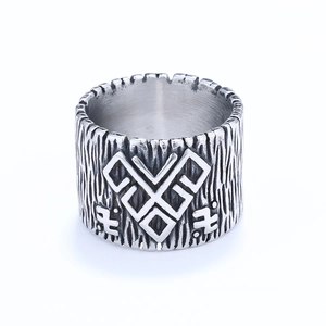 Vintage stainless steel wide ring with tree bark texture and geometric viking runes