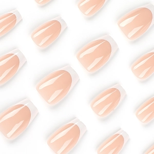 Short coffin press-on nails featuring a French white tip design with glossy pink base