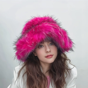 Detailed texture of thick rose red and dark faux fur on a winter punk style bucket hat