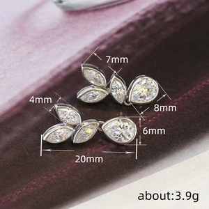 Silver leaf and teardrop earrings with crystal rhinestones and dimension labels