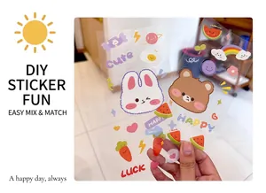 Detailed view of waterproof transparent cartoon stickers with cute rabbit and bear motifs