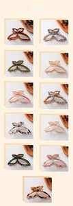 Detailed collection of 11 multi-colored butterfly hair claws in acetate finish