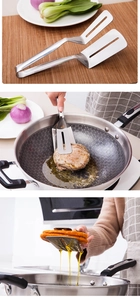 Macro shot showing stainless steel food tongs flipping meat steaks in a frying pan