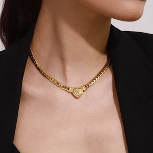 Gold heart pendant necklace with cubic zirconia on chunky cuban chain for women