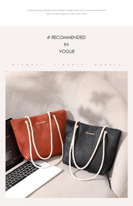 Detail of chevron quilted tote bags in black and orange with stylish rope handles