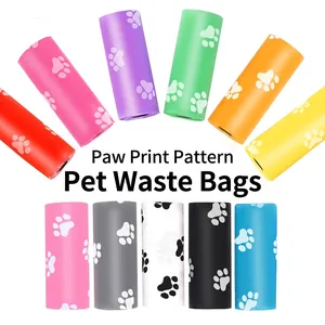 Biodegradable pet waste bags in a colorful roll design with printed paw patterns