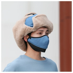Close-up of winter trapper hat with detachable face mask and thick thermal fleece lining