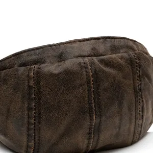 Retro brown distressed leather beret featuring vintage flat cap design and stitch details