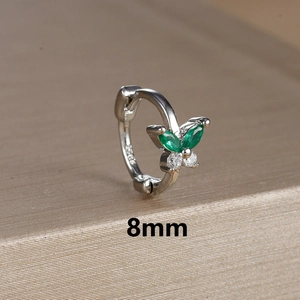 Close-up of 8mm silver butterfly ear cuff with green and white zircon gemstones