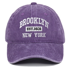 Detailed front view of purple cotton baseball cap with white Brooklyn 1631 embroidery