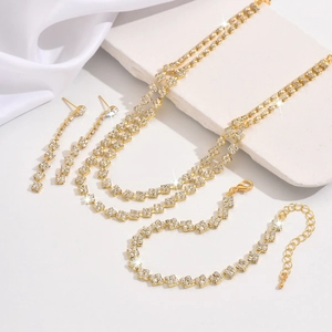 Luxuriöses Brautschmuck-Set in Gold mit Strass-Halskette und Quasten-Ohrringen