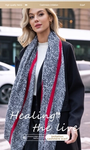 Street style shot of herringbone cashmere imitation scarf with vibrant red edges