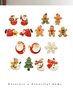 Set of 14 Christmas resin fridge magnets including Santa, gingerbread man and snowman
