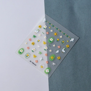 Detailed 5D embossed nail stickers featuring spring daisies, tulips and birds textures