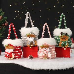 Set of 4 knitted Christmas gift bags with 3D Santa, Reindeer, Bear and Snowman dolls