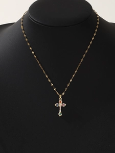 Detail of cross pendant necklace with multi-colored cubic zirconia on black neck bust