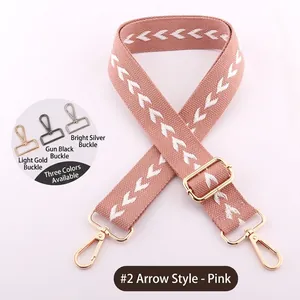 Pink adjustable embroidered arrow strap with options for light gold, gun black, or silver hooks