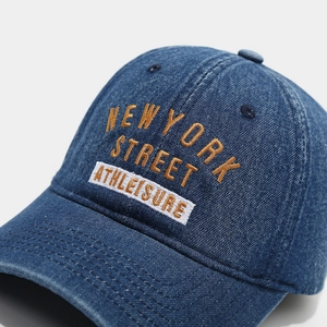 Blue denim baseball cap with New York embroidery and vintage washed texture