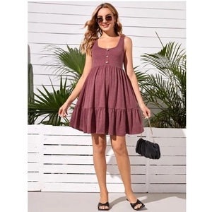 Detail of dark purple ribbed maternity dress with front buttons and ruffled tiered hemline