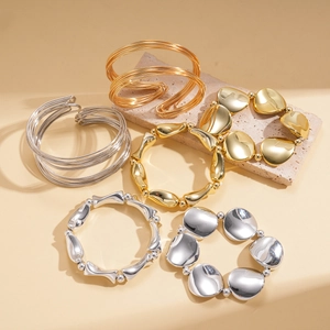 Three-piece set of twisted geometric gold and silver double-layer open bangle bracelets