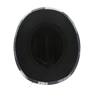 Detail of western fedora hat with black crown and black-and-white plaid patterned brim