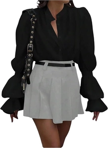 Detail of elegant lantern sleeves and ruffled cuffs on a black commuter shirt for women
