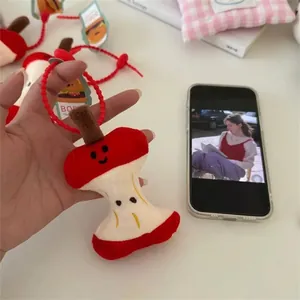 Cute apple core plush keychain charm with funny face expression for bags and gifts