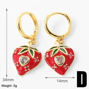 Close-up of strawberry drop earrings with red enamel and heart-shaped zircon details