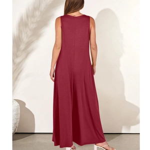 Back view of a sleeveless burgundy wide-leg jumpsuit showing its elegant draped fabric