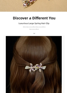 Detail of luxury large spring hair clip with pink crystals and pearls in double flower design