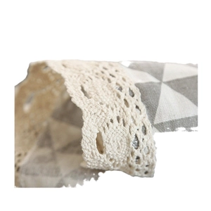 Minimalist black and white plaid tablecloth with delicate lace trim edging decoration