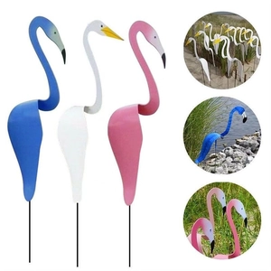 Three-piece swirl bird flamingo garden stakes in blue white and pink colors for yard decor