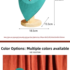 Detail of teal velvet jewelry display stand with light wood base and dimension markers