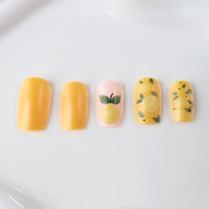 Glossy square press-on nails featuring fresh yellow lemon and floral summer patterns