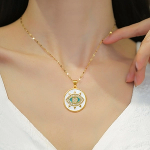 Gold stainless steel evil eye pendant necklace with white enamel and blue stones