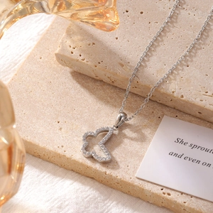 Elegant butterfly pendant necklace in titanium steel with shimmering zircon accents