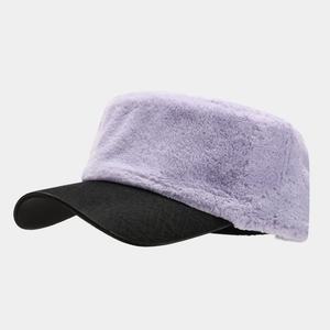 Detail of plush faux fur flat top hat with faux snakeskin brim in light purple and black