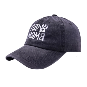 Detail of embroidered Fur Mama text and paw print on washed grey cotton baseball cap