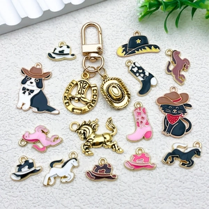 Western cowboy keychain set with horse shoe, hat and boot enamel charms in gold finish